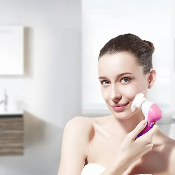 AquaSpin waterproof facial cleansing brush with 5 brush heads